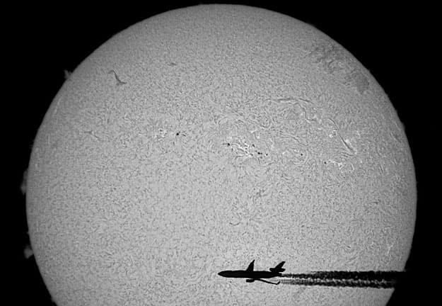 An Airplane in Front of the Sun