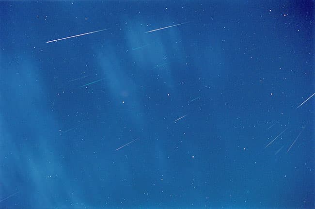 Meteors Between Stars and Clouds