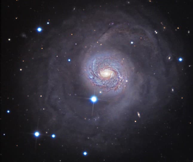 The Outskirts of M77
