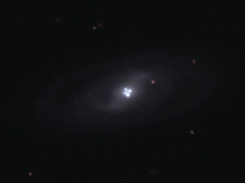 The Einstein Cross Gravitational Lens
