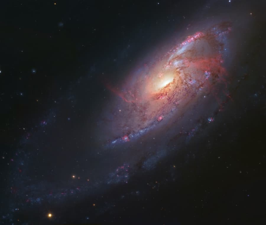 The Arms of M106