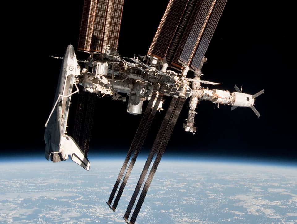 Space Shuttle and Space Station Photographed Together