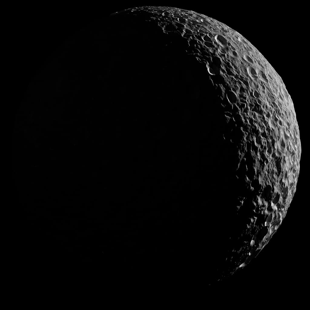 Mimas in Saturnlight