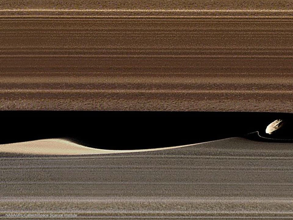 Daphnis and the Rings of Saturn