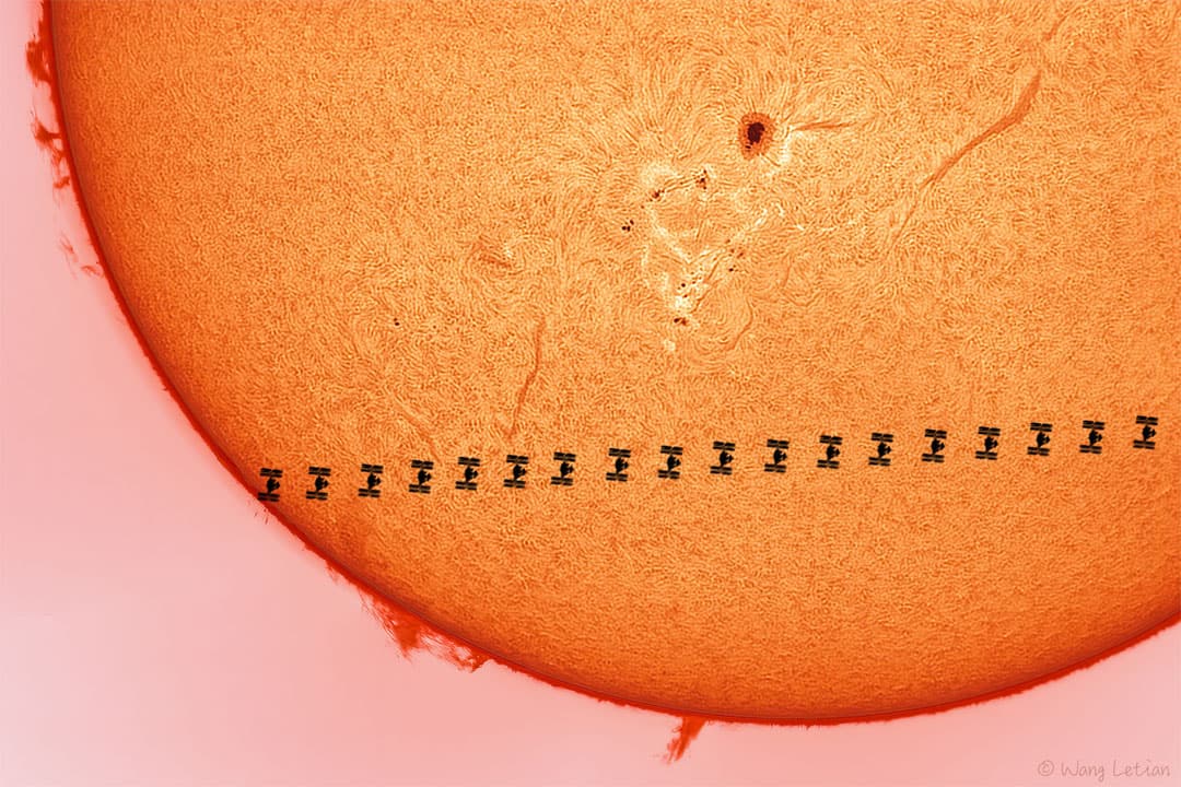 A Space Station Crosses a Busy Sun