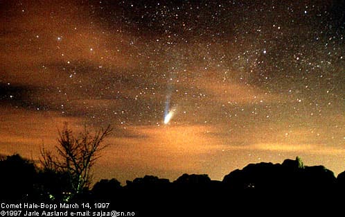 Earth, Clouds, Sky, Comet 
Credit and Copyright:
